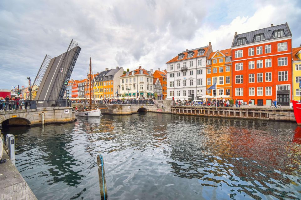 Copenhagen: Canal Boat Cruise & Old Town/Nyhavn Walking Tour - Key highlights to know before you go