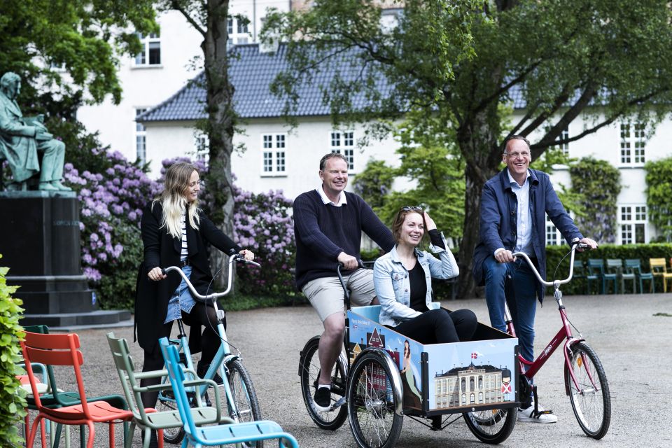Copenhagen: City Highlights Guided Bike Tour - The bike setup: headsets, optional helmet, and real comfort gear