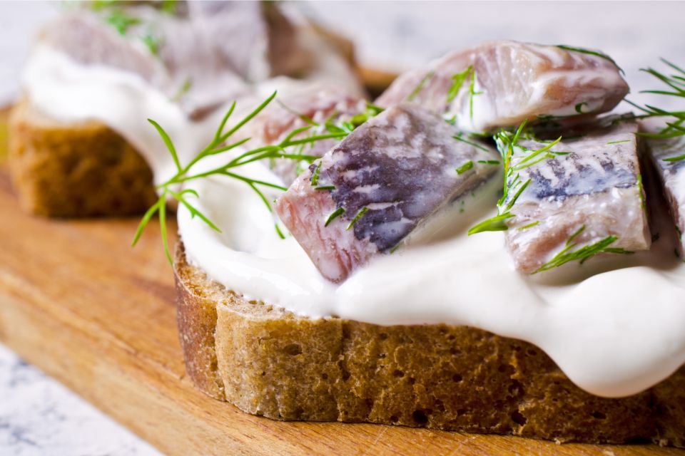 Copenhagen: Scandinavian Delights Food & Drink Private Tour - Stop 1 at DØP: ristepølse and an elderflower-style aperitif