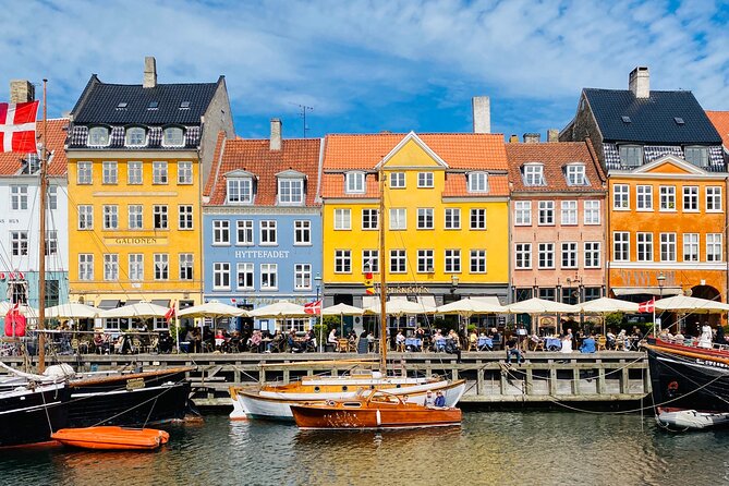 Private Copenhagen Boat cruise in Scandinavian mahogany boat - Christiania’s area, nude bathing beach, and the point of it all